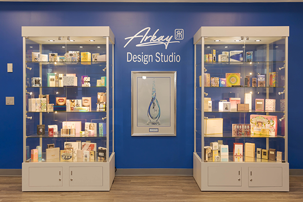 Display case with Arkay luxury packaging examples