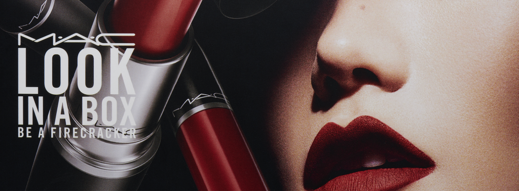 Woman wearing MAC red lipstick pictured alongside the lipstick tube